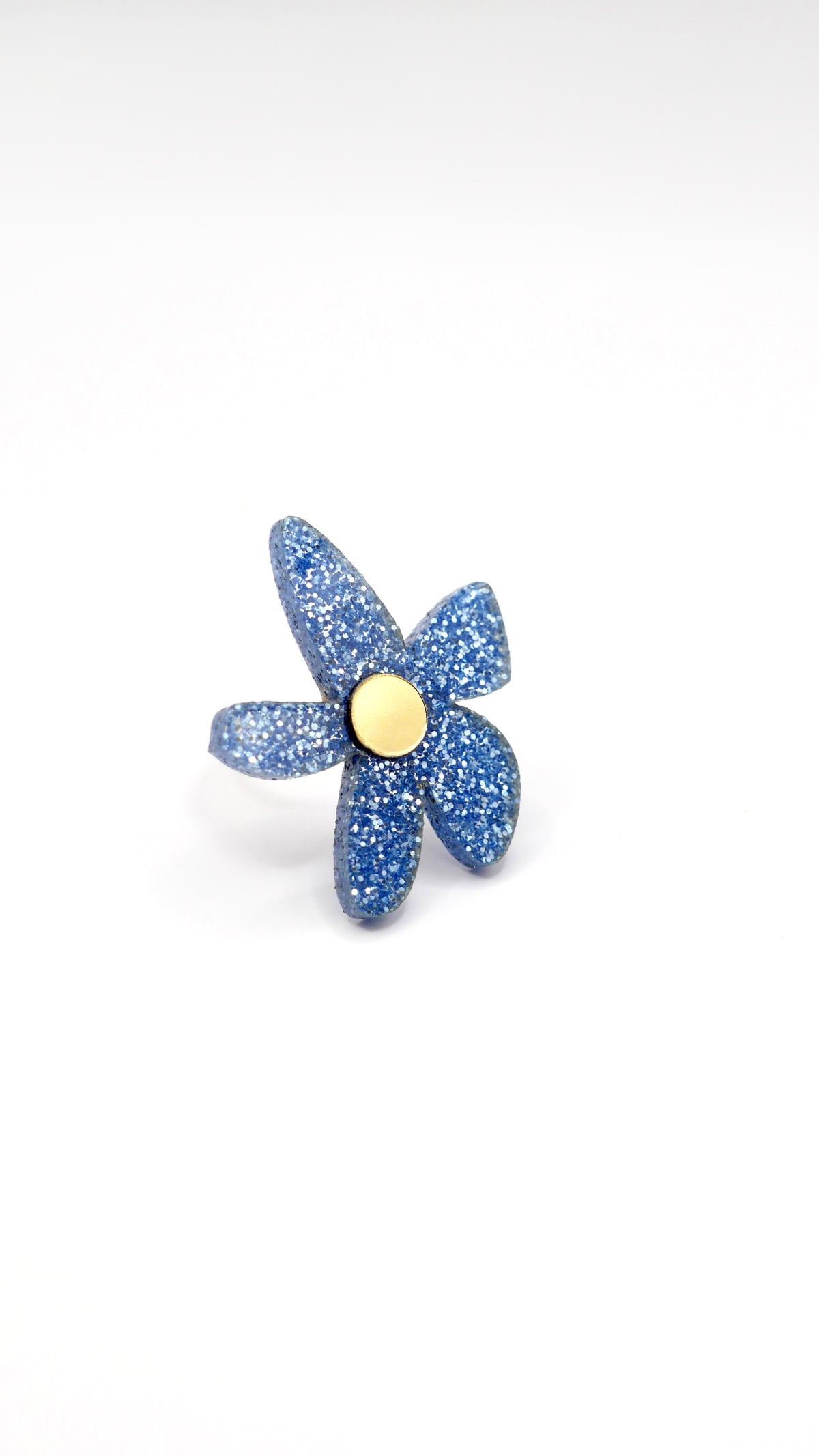 Bague flores en plexiglass bleu pailleté 