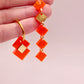 Boucles d’oreilles en plexiglass orange 