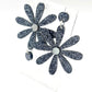 Boucles d’oreilles asymétriques Daisy paillettes argentées 