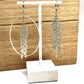 Boucles d’oreilles asymetriques liane, en laiton argenté 
