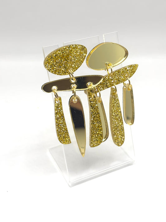 Boucles d’oreilles Phœnix dorées à paillettes 