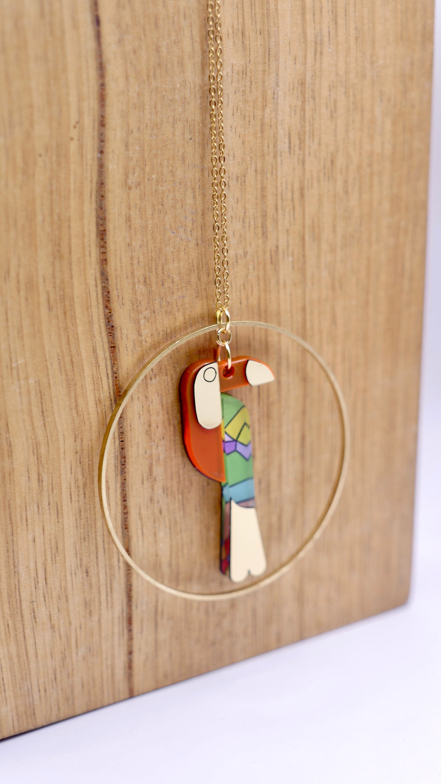 Sautoir toucan orange et vitrail 
