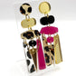 Paire de boucles d’oreilles asymétriques Scandi léopard et rose 