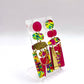 Paire de boucles d’oreilles asymétrique tropicale et rose 